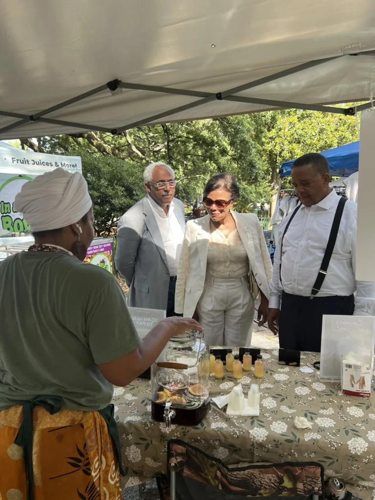 Pure Love Pantry serving guests at an outdoor community market