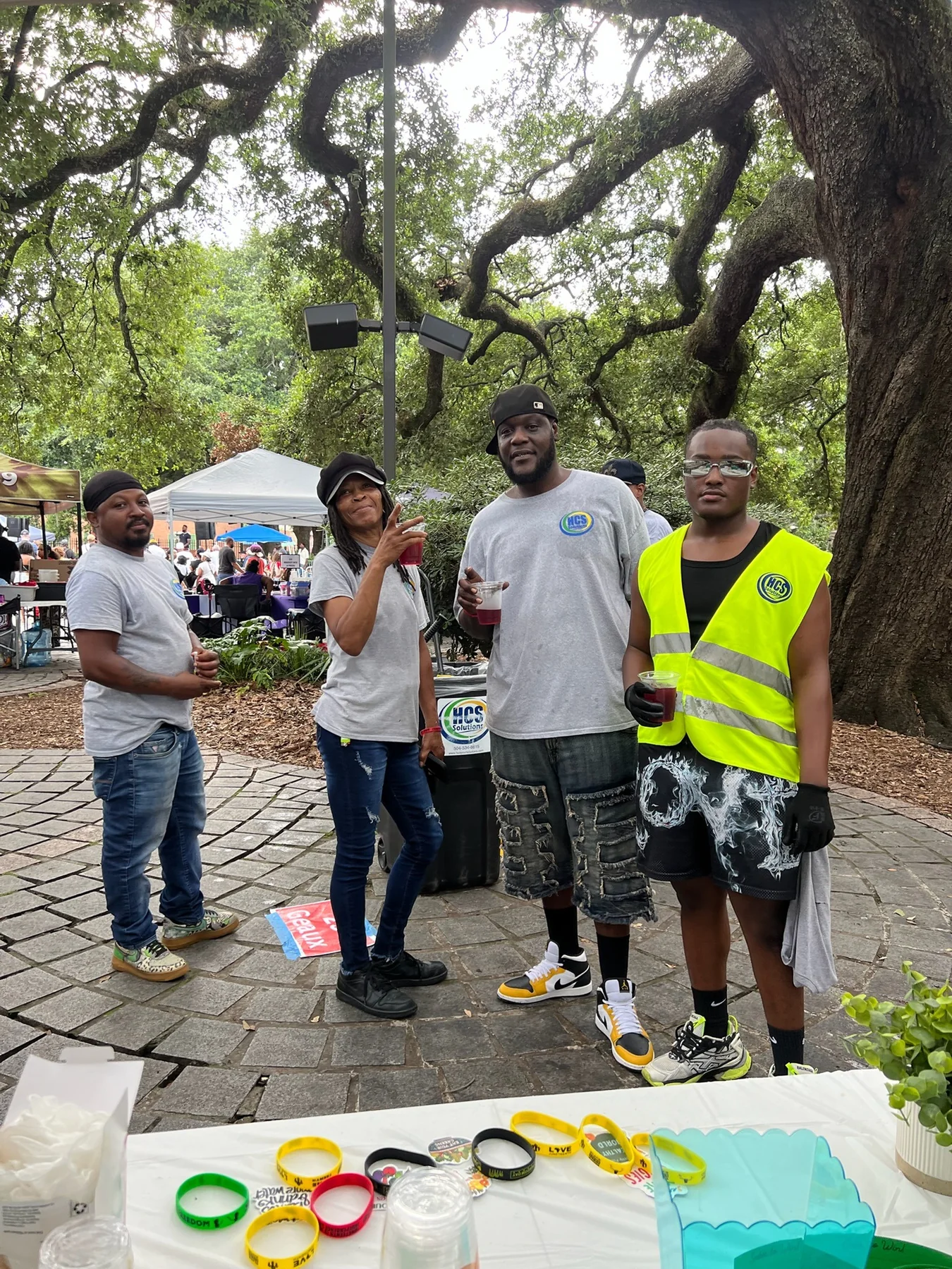 A community group gathered near the Pure Love Pantry booth