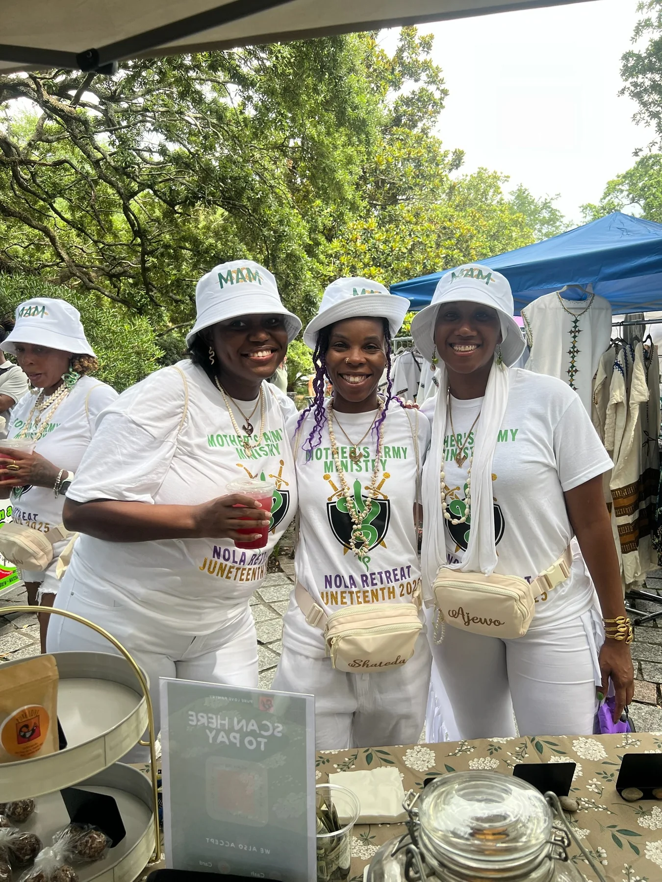 A group celebrating Juneteenth with Pure Love Pantry drinks