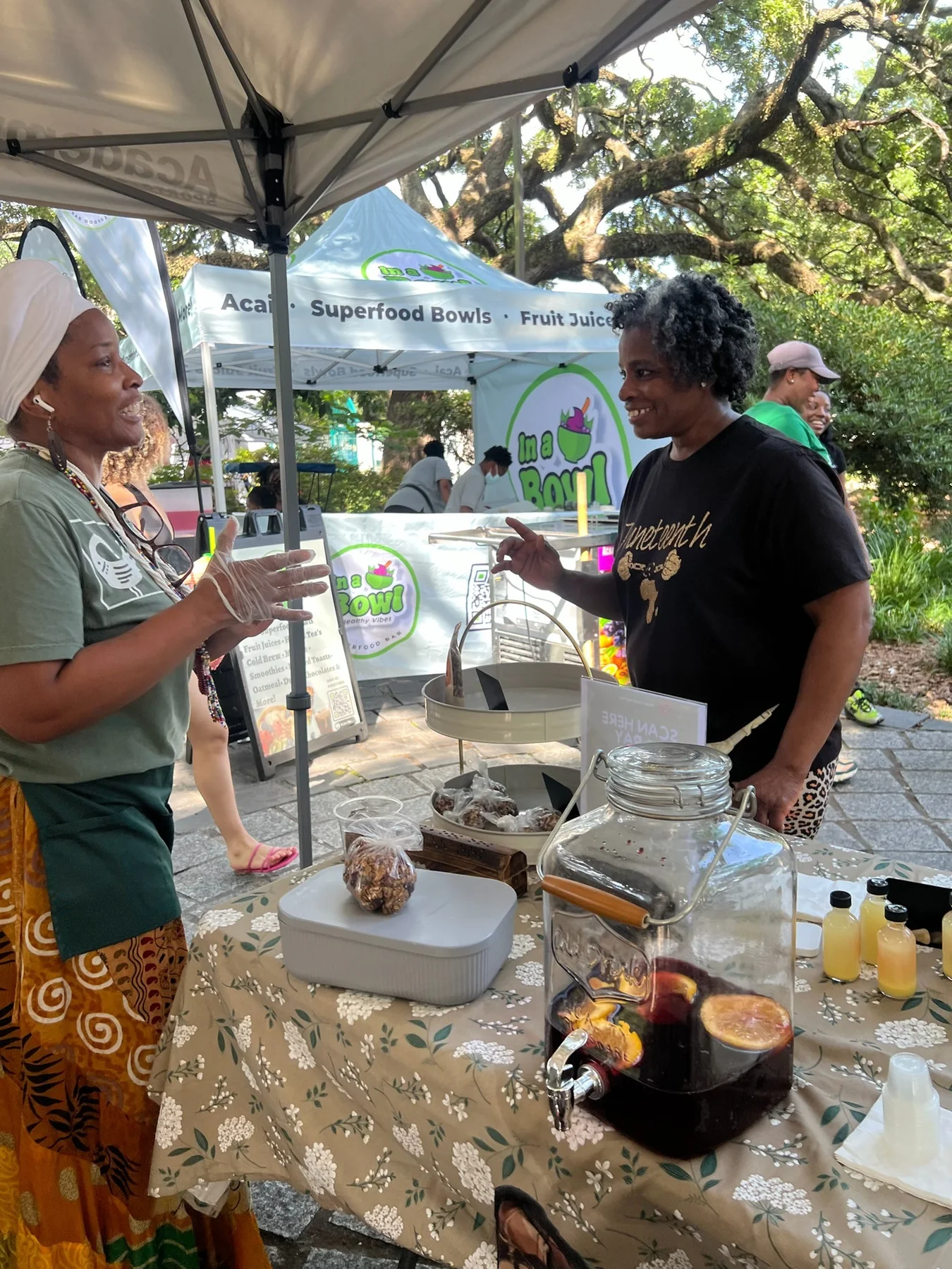 Wendy Firven speaking with a community member