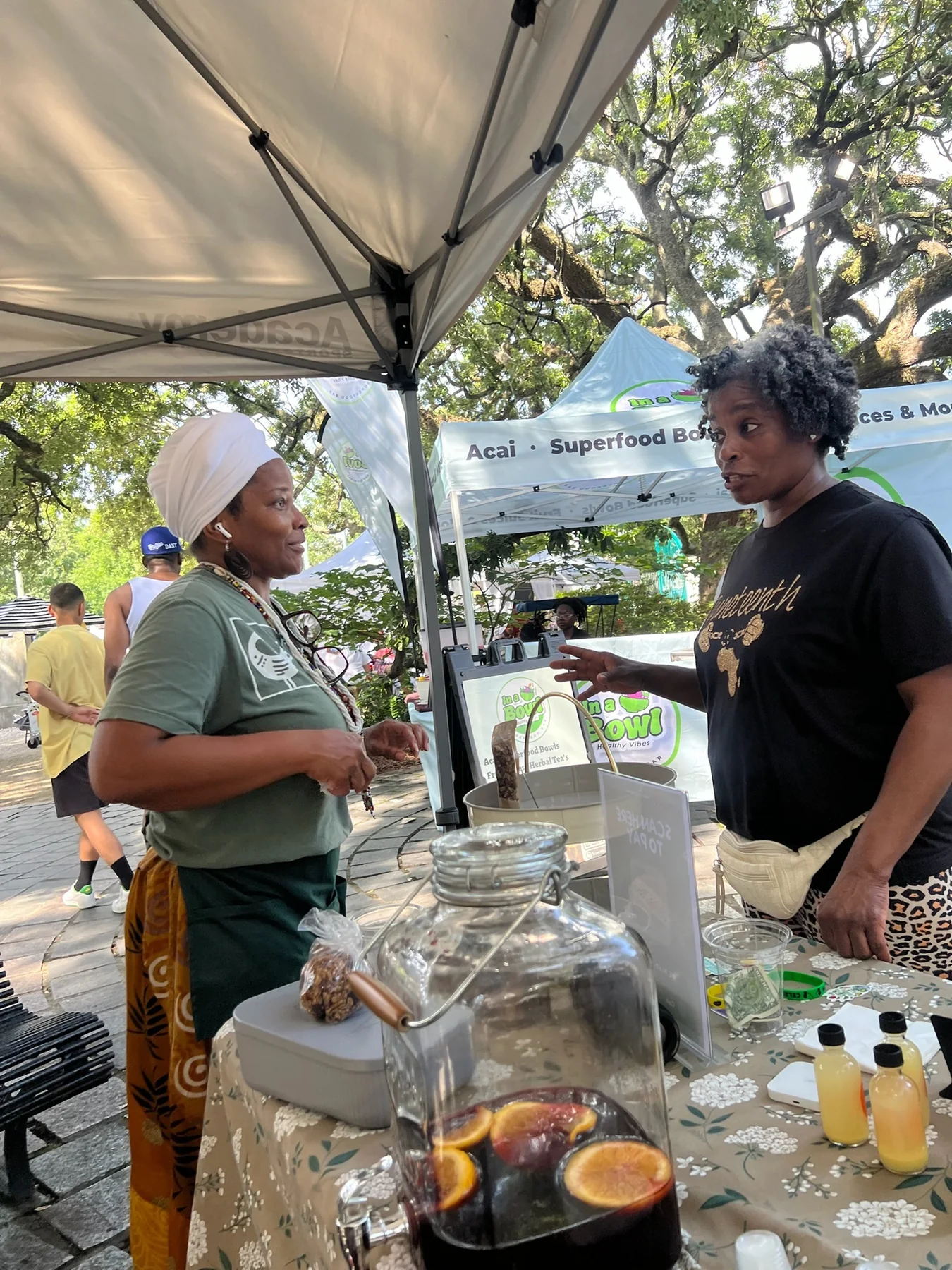 Wendy Firven sharing wellness information at a market