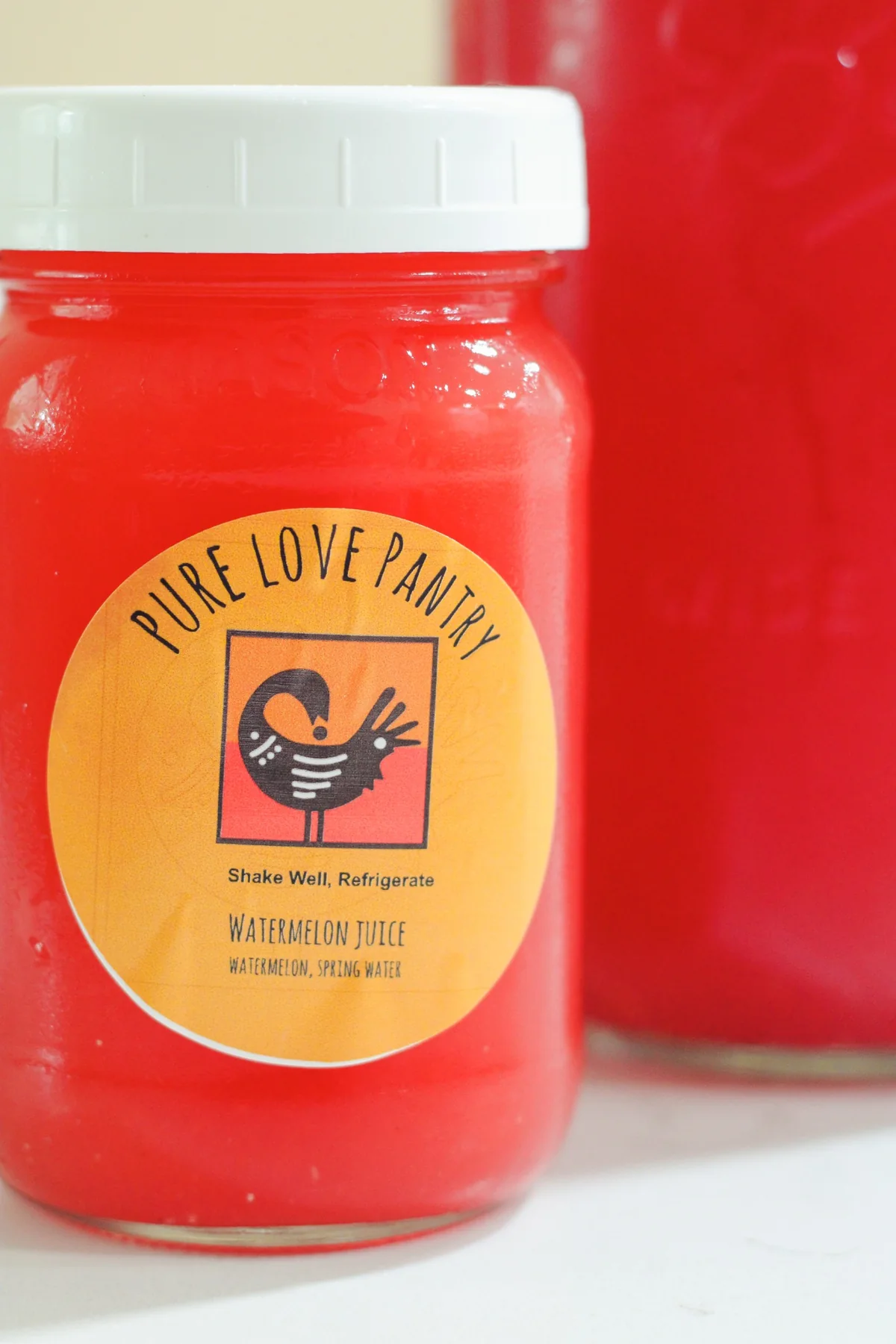 Pure Love Pantry watermelon juice in a glass jar
